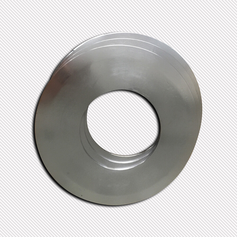 Discos separadores circulares con tolerancia de dibujo de paralelismo de 0,01 mm de tolerancia.
   